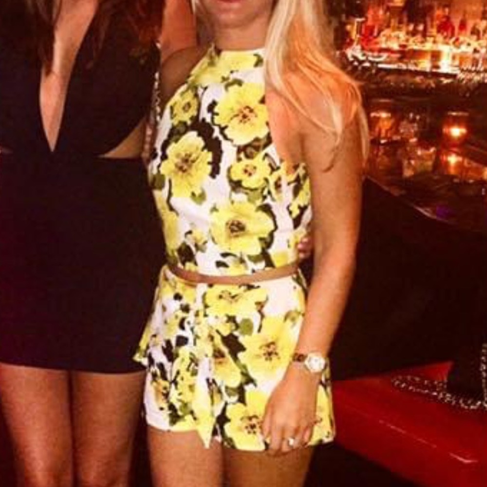 JOA two piece set size XS yellow flowers bottom is shorts top has open back